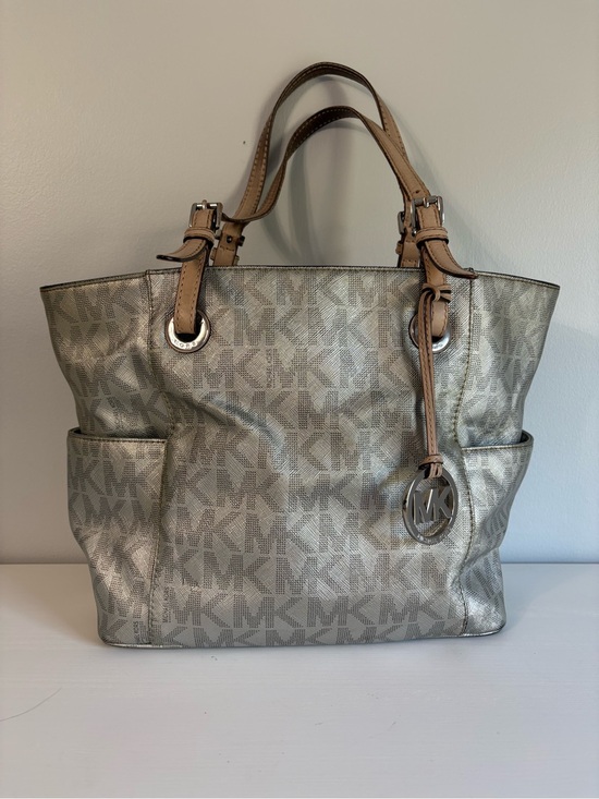 Michael Kors Handbags - Michael Kors Silver Metallic East West Signature Monogram Chain Tote Bag